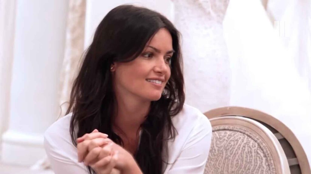 Bridal consultant recognizing former The Bachelor contestant Courtney at her sister's fitting.
