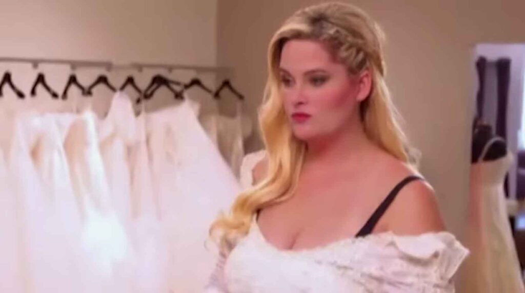Bridal consultant suggesting a healthy compromise by turning vintage family lace into a bridal garter