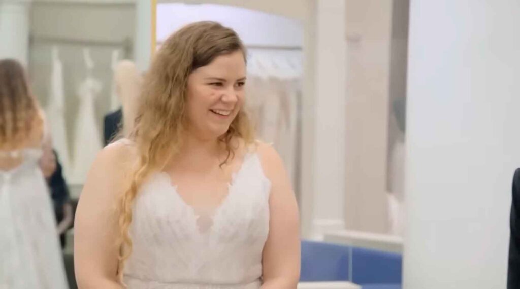 Polyamorous bride feeling awkward and wanting to hide after being forced into a traditional wedding dress