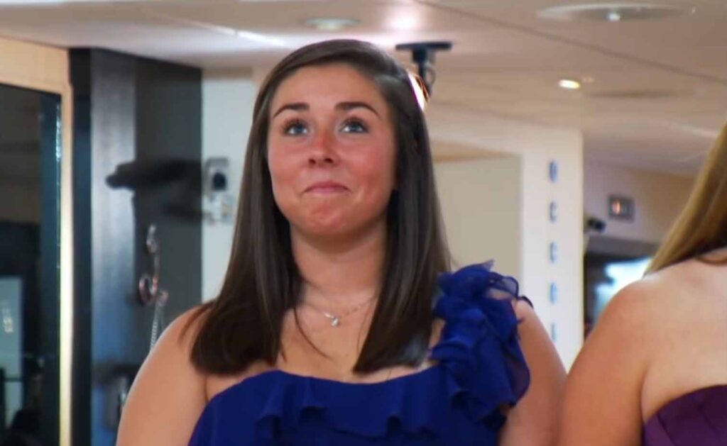 Bridesmaid looking sad and ready to cry after being laughed at by the bride's mom