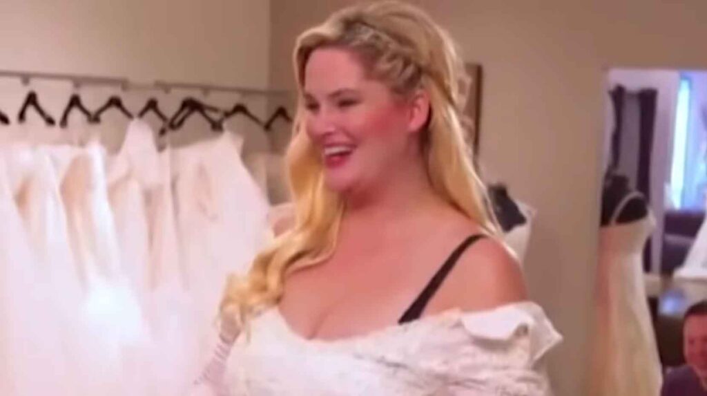 Plus-size bride Whitney Thompson trying on her mother's vintage wedding dress and realizing it does not fit her body shape