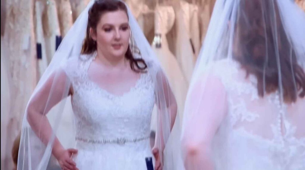 Wedding planner bride thrilled with her perfect fit and flare wedding dress
